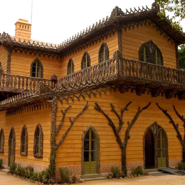 The Chalet of the Countess of Edla in the Pena park: a Swiss-style cottage with cork-bark trimmed balconies and pointed window arches